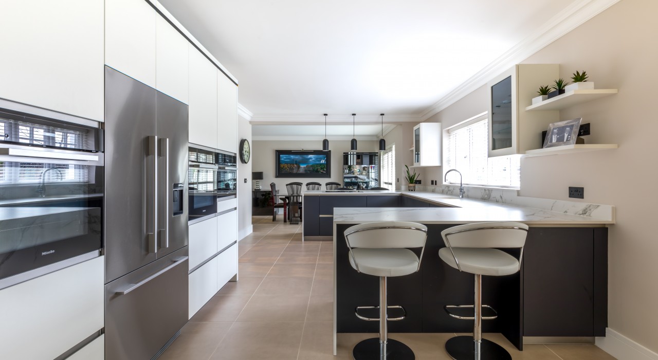 Black and white kitchen with Meile appliances