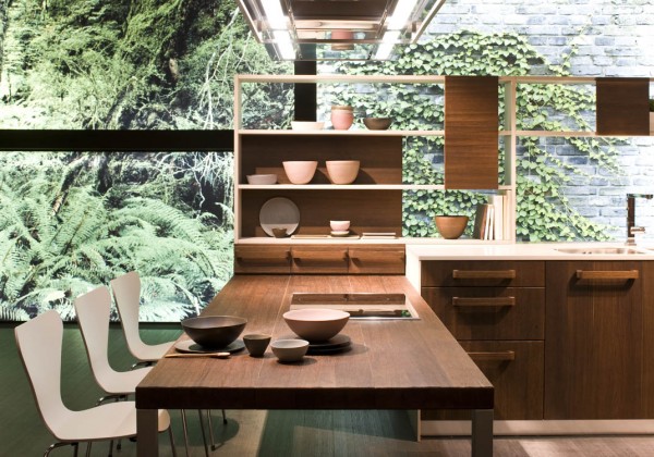 Open shelving kitchen against a large window