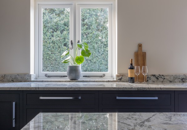 Marble kitchen worktop in front of window