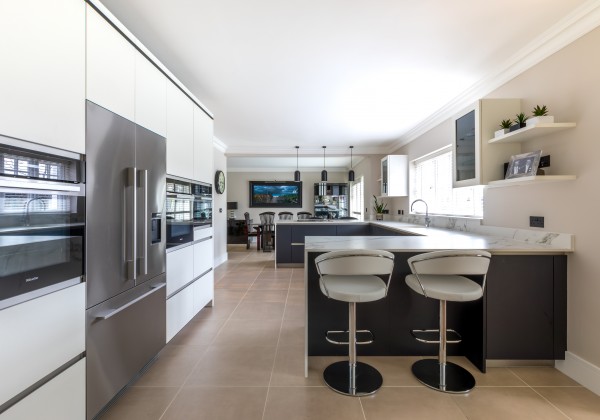 Black and white kitchen with Meile appliances